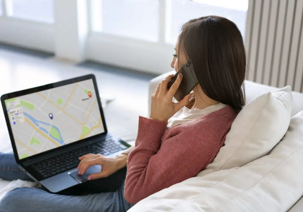 side-view-woman-holding-laptop